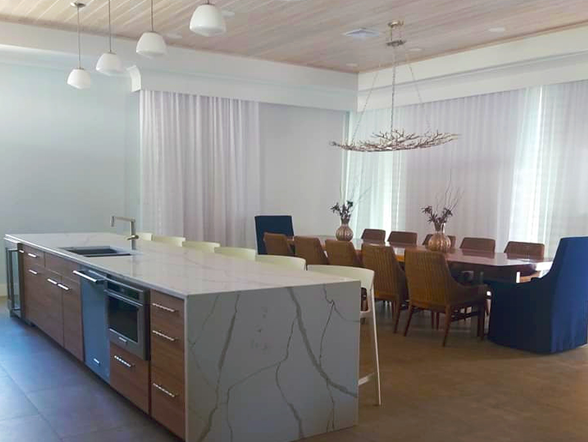 Custom kitchen island with waterfall stone