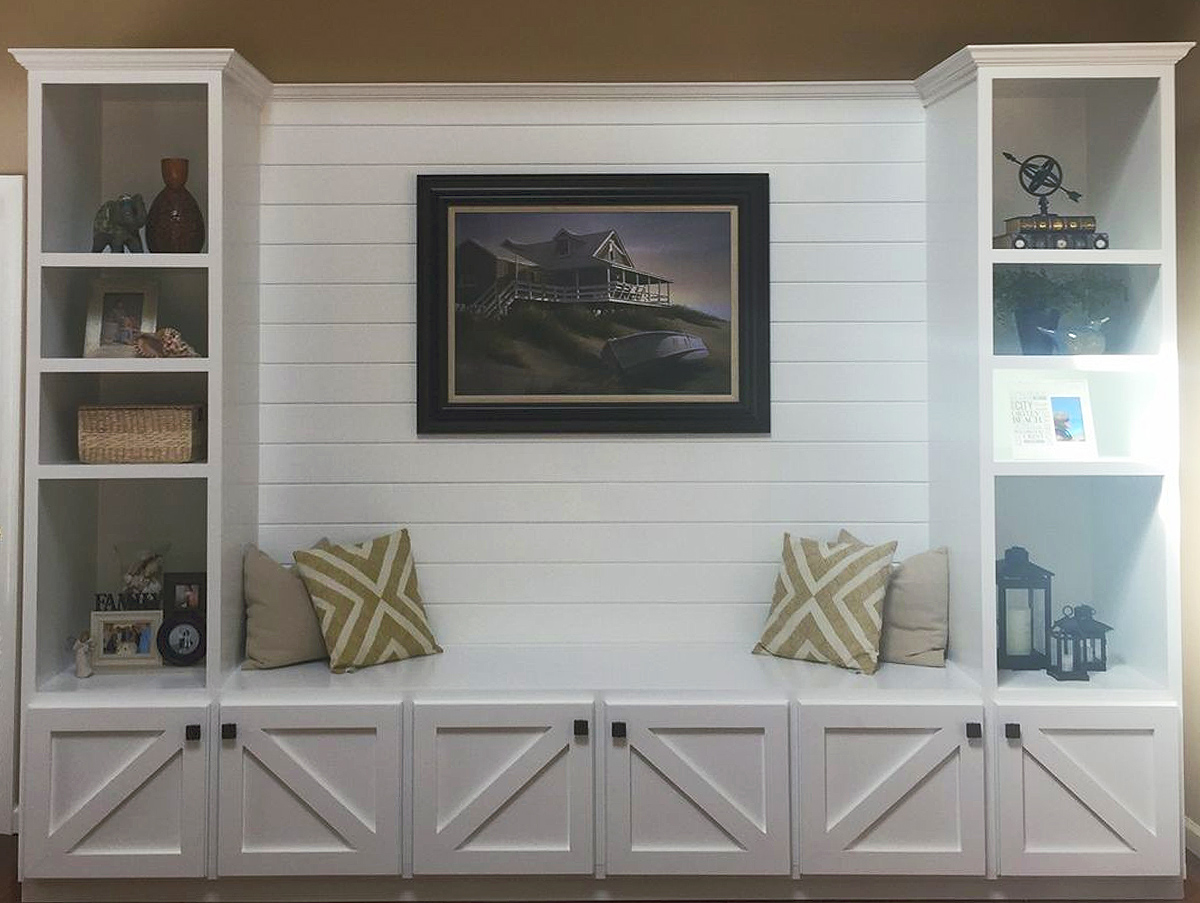 Custom built-in cabinetry and shiplap wall